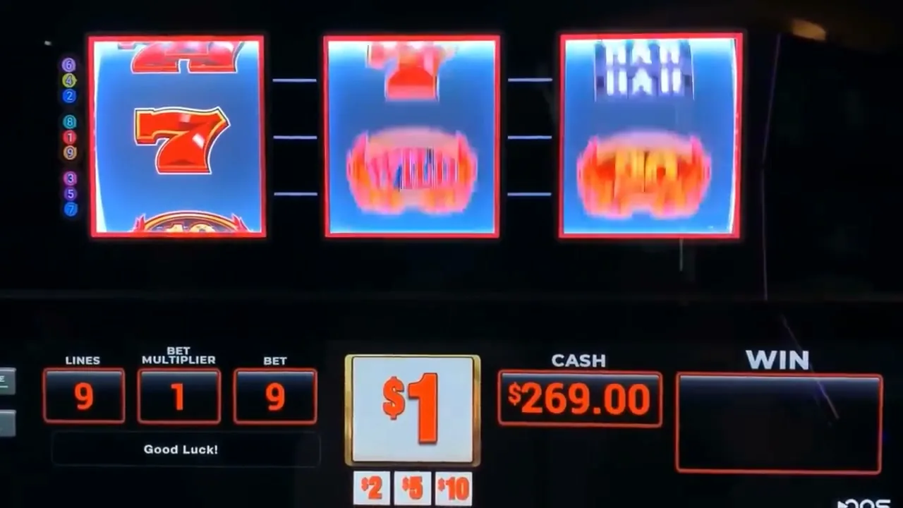 Compteur de jackpot progressif affiché au-dessus des rouleaux d'une machine à sous